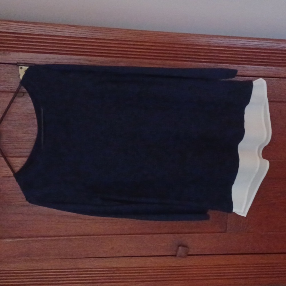 Womens 1 piece sweater, with long tail.